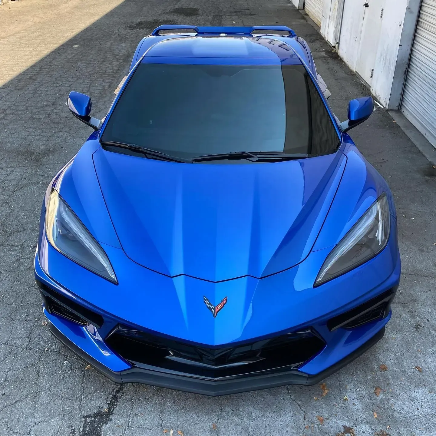 Blue Chevrolet Corvette C8 with premium ceramic window tint at JTINT in Murrieta, CA